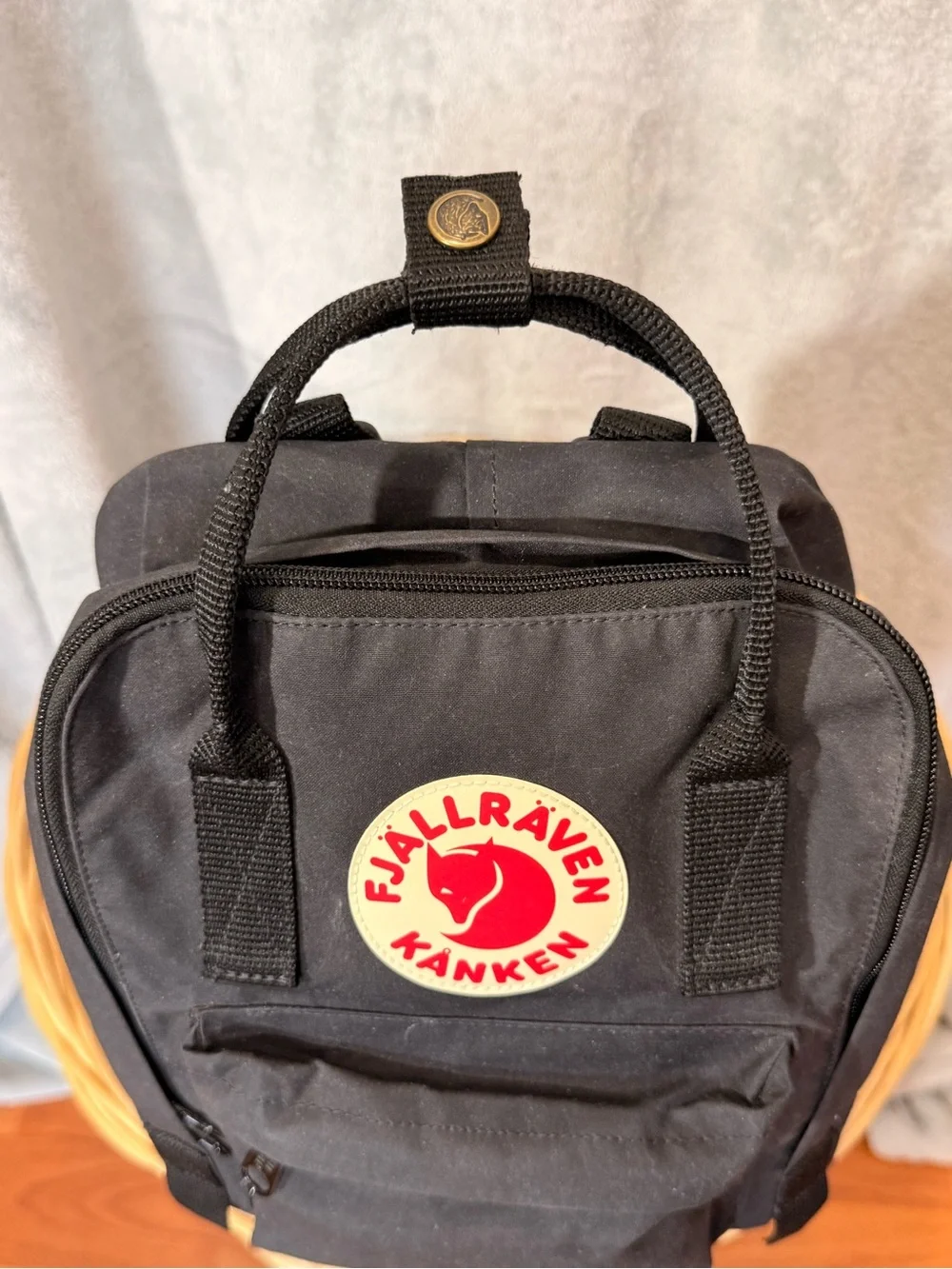 Fjallraven Kanken Mini Backpack in Black with Red Logo